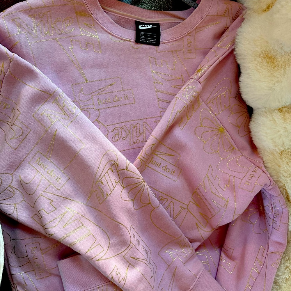 NIKE women's XL pink sweatshirt with gold floral design. Worn once; non-smoking